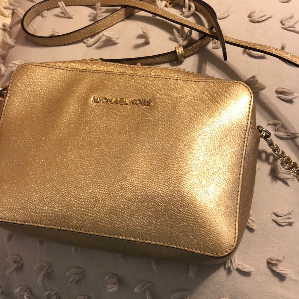 Shiny gold Michael Kors crossbody